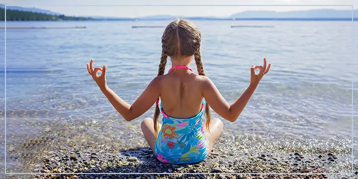 Back View of Woman in the Beach Doing a Yoga Pose · Free Stock Photo